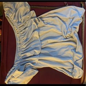 blue off the shoulder shirt